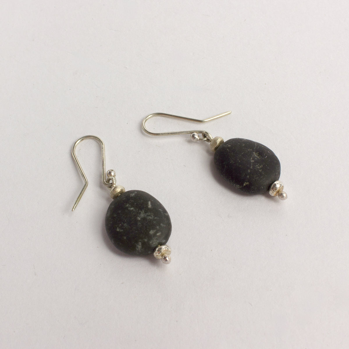 ACT406: Orepuki stone earrings - black speckle