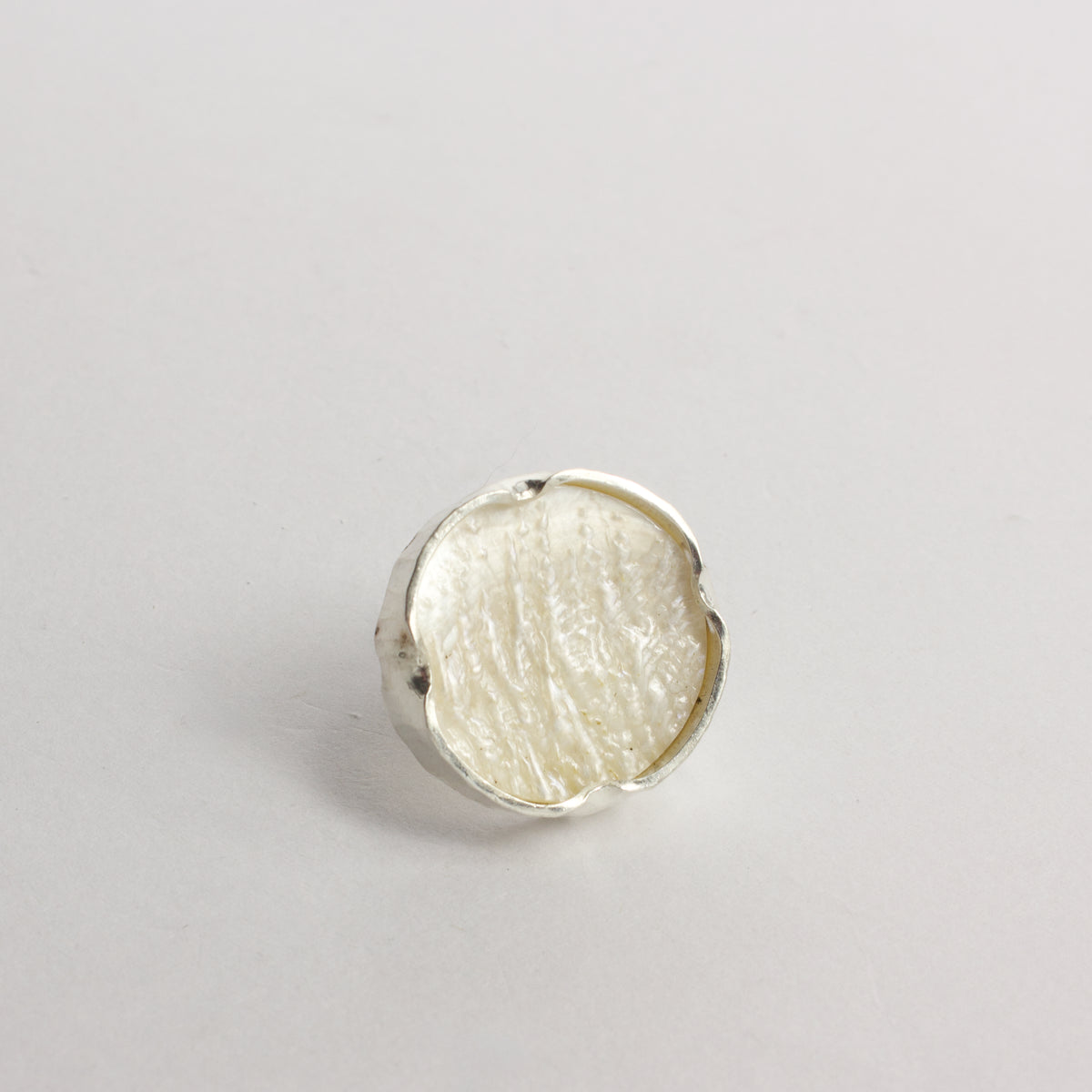 DM423C: Textured mother of pearl brooch