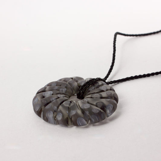 GSM31: Carved shell pendant - black and white