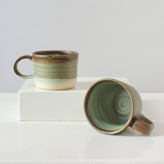 HP Mugs: brown and green on white clay