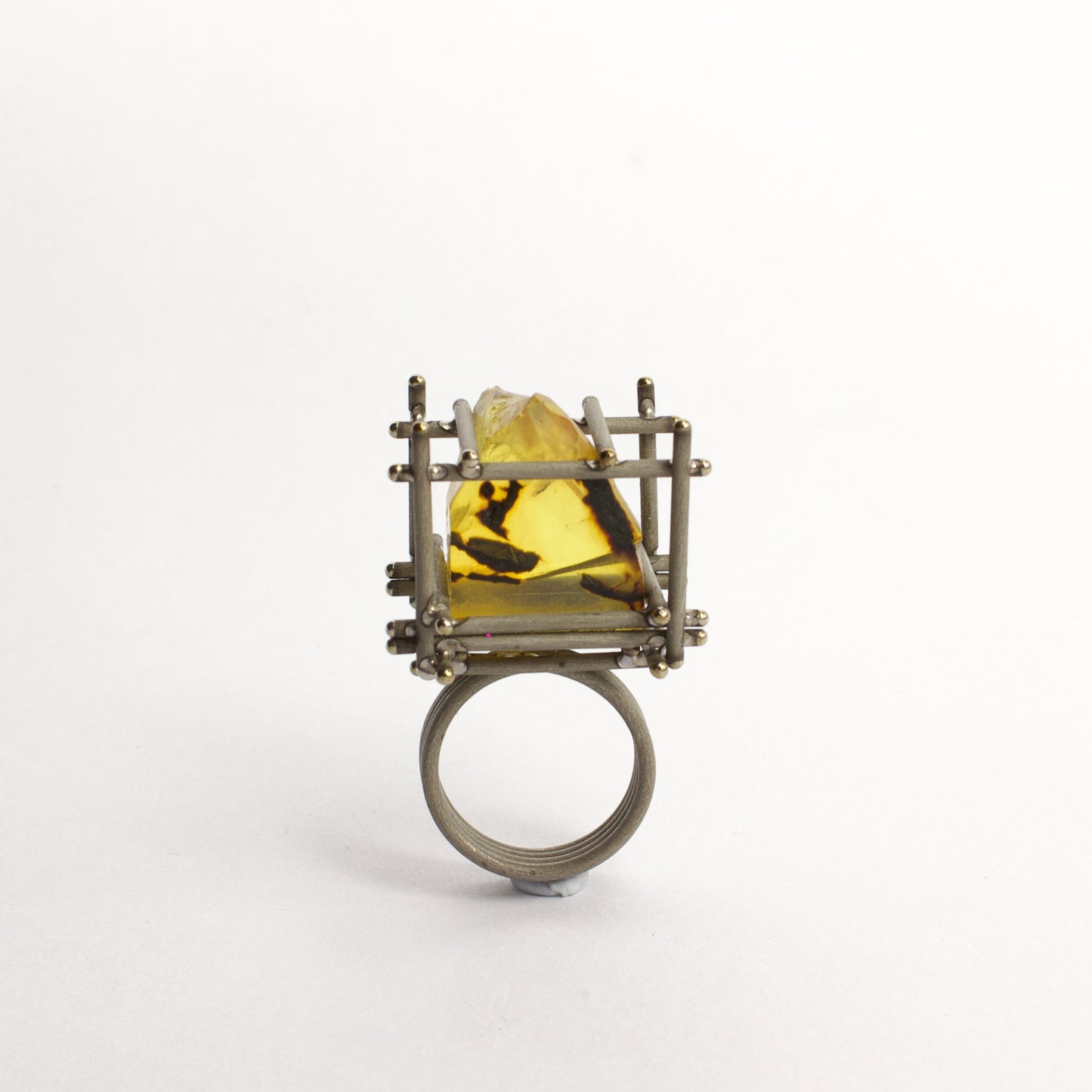 NA129: New Zealand amber and titanium ring