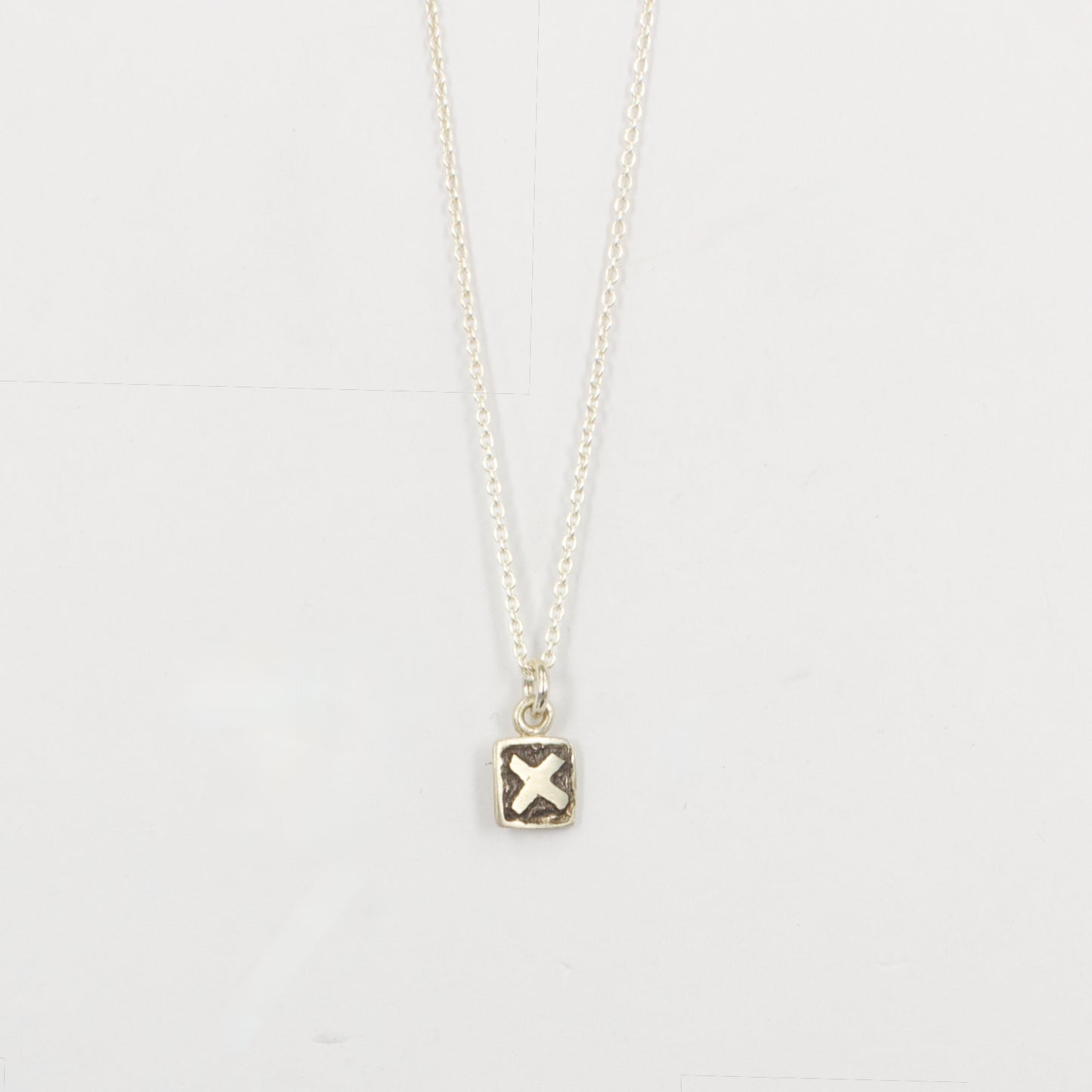 JMU129: X tile pendant