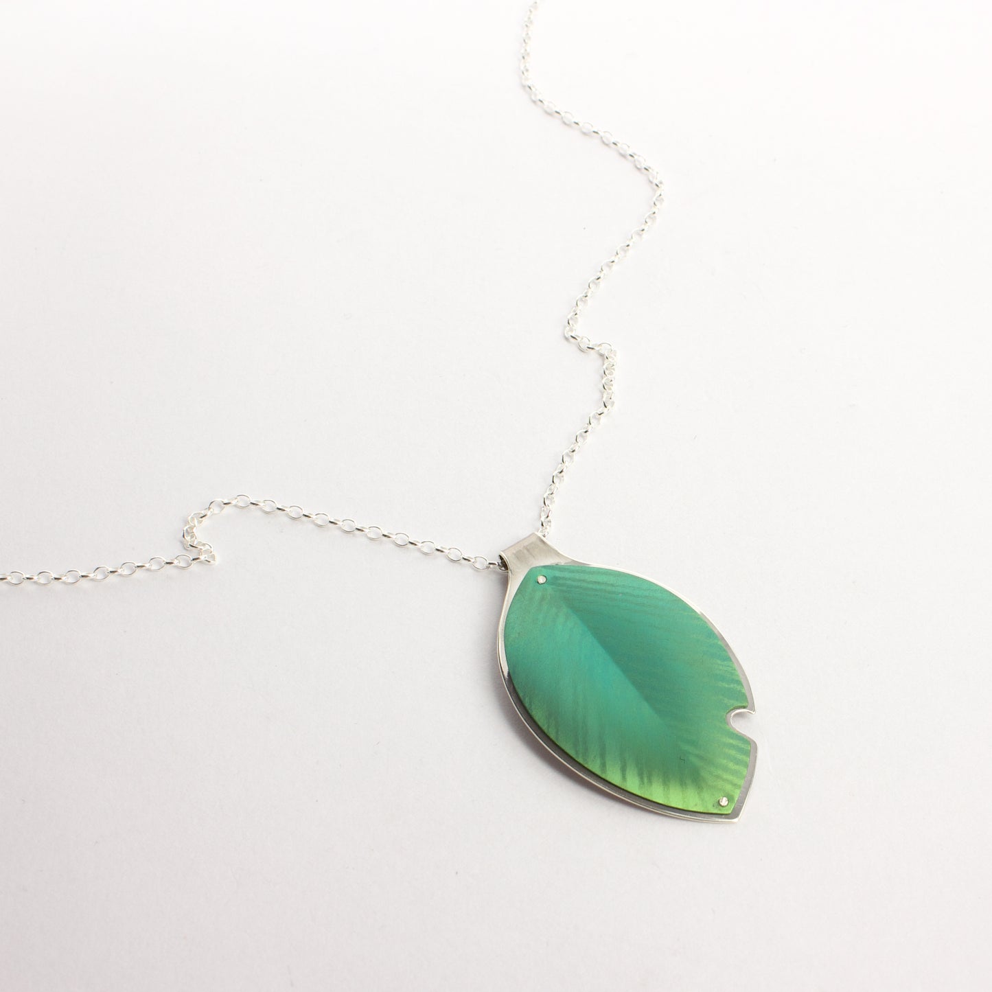 RB219: Pōhutukawa pendant with bite out