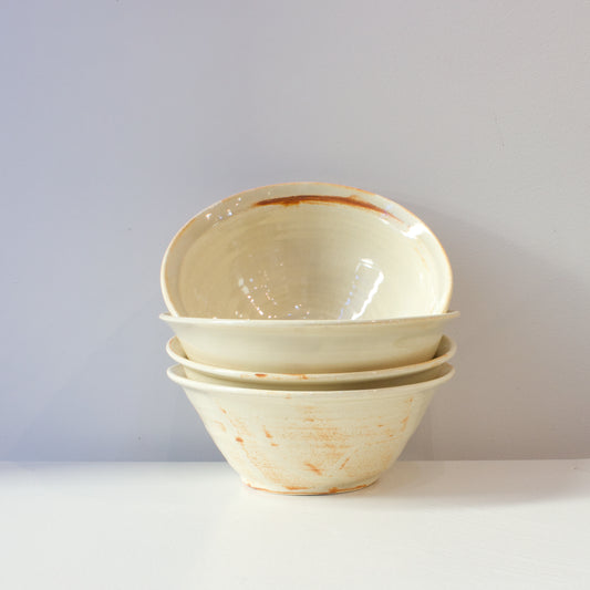 JLA: Sand coloured bowls with orange detail