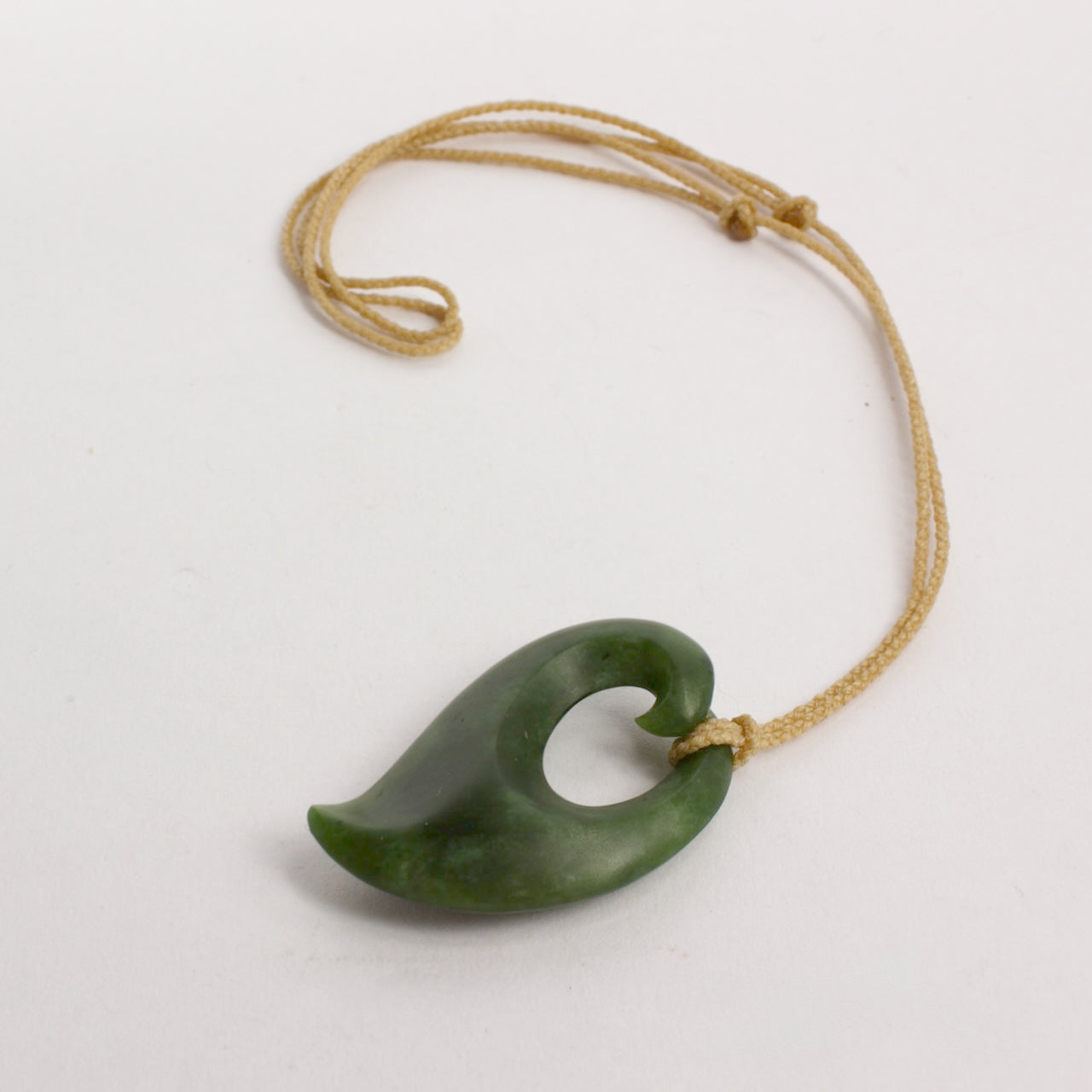 KAJ188: Pounamu fish hook pendant