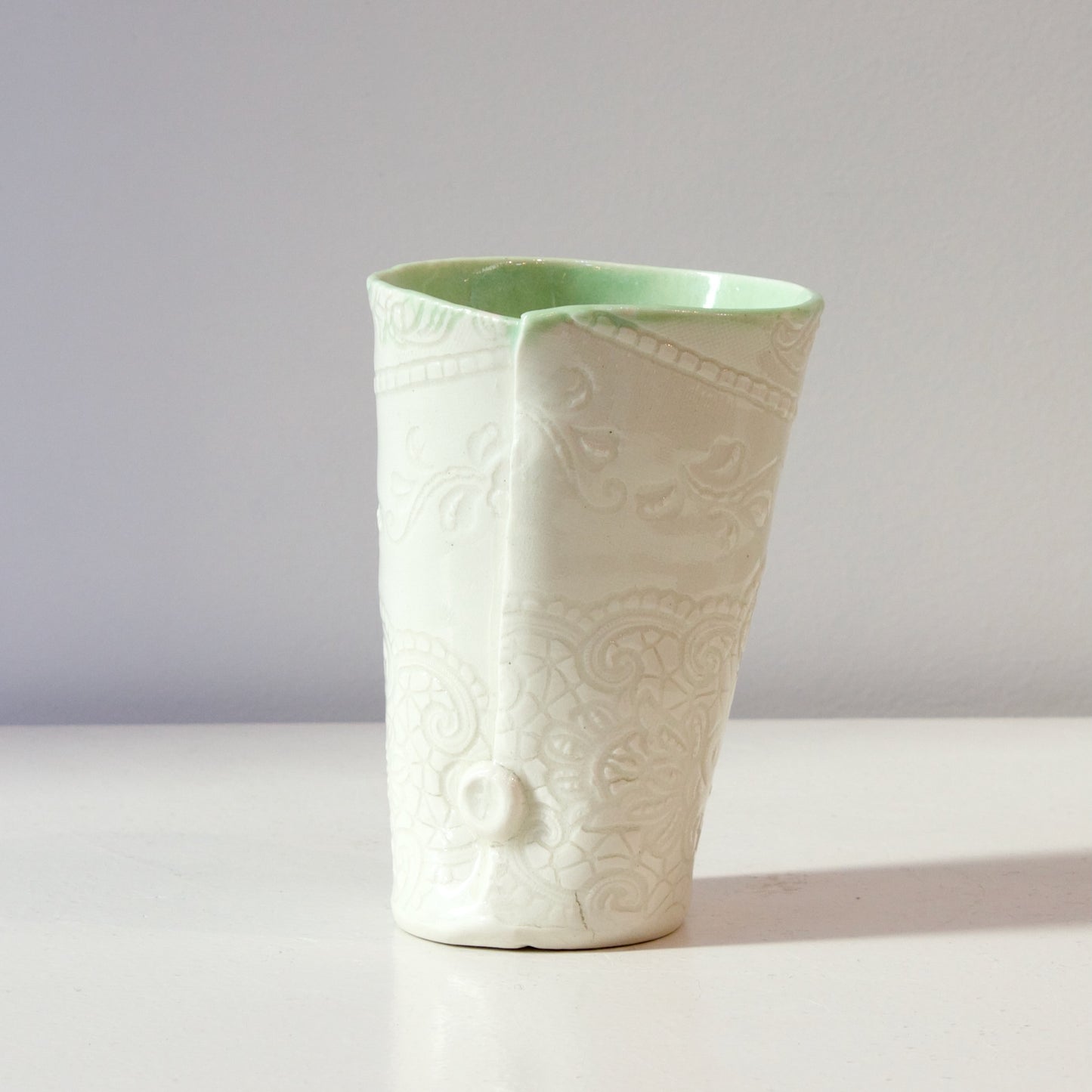 NML245: Embossed beaker