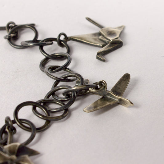 RF135: Flight charm bracelet