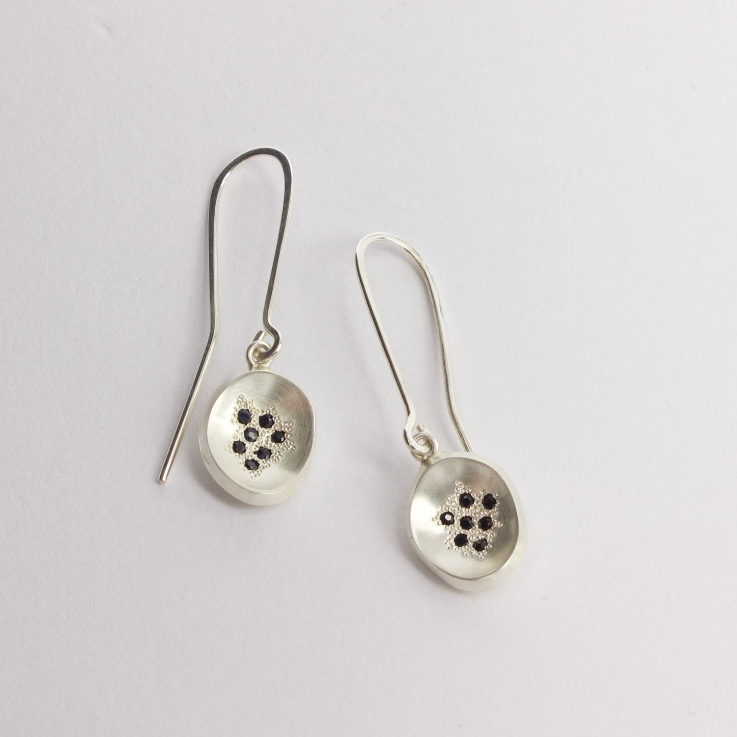 RMO57: Concave drop earrings with sapphires