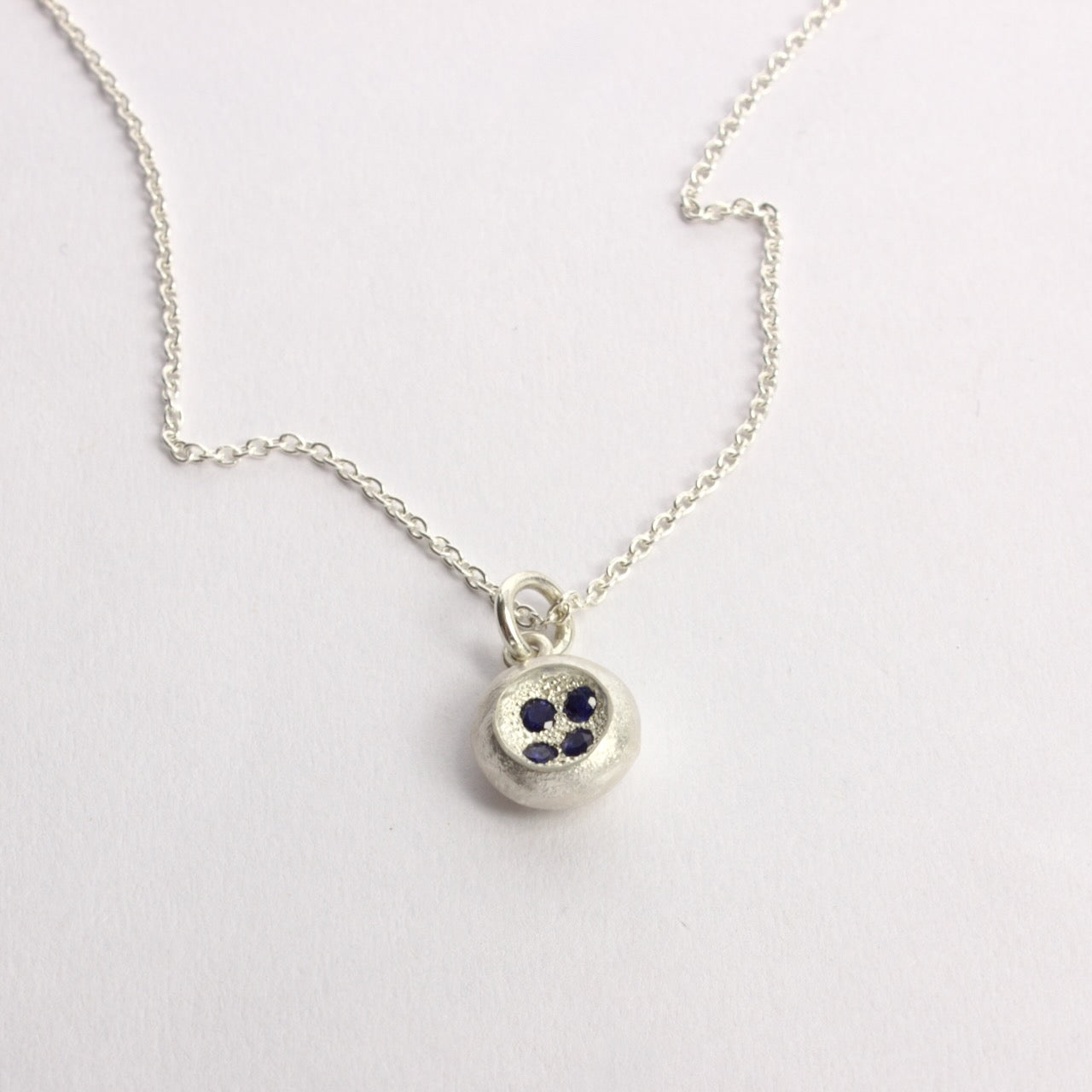 RMO69: Rock pool sapphire pendant