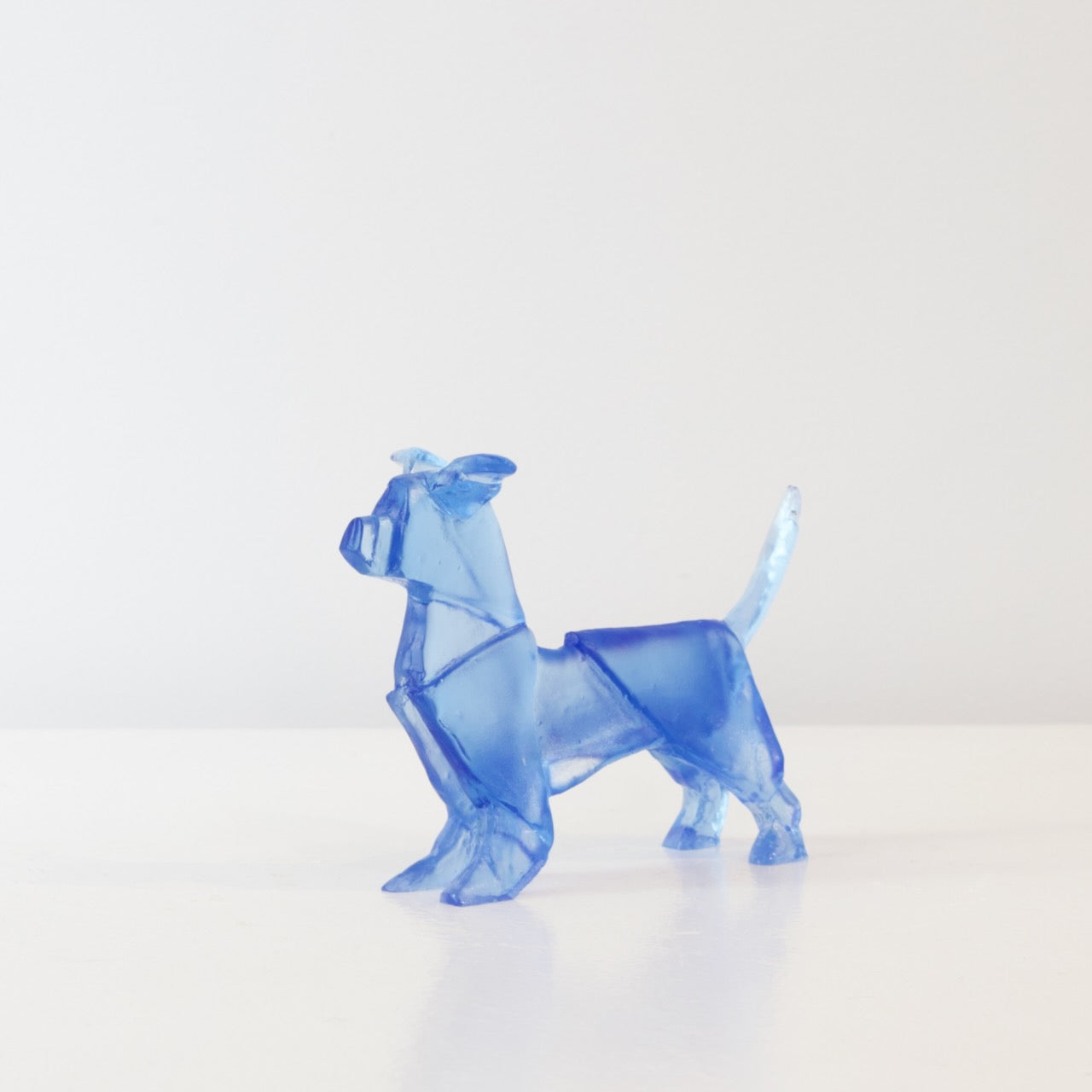 TBA110: Origami terrier dog with crooked ears - blue