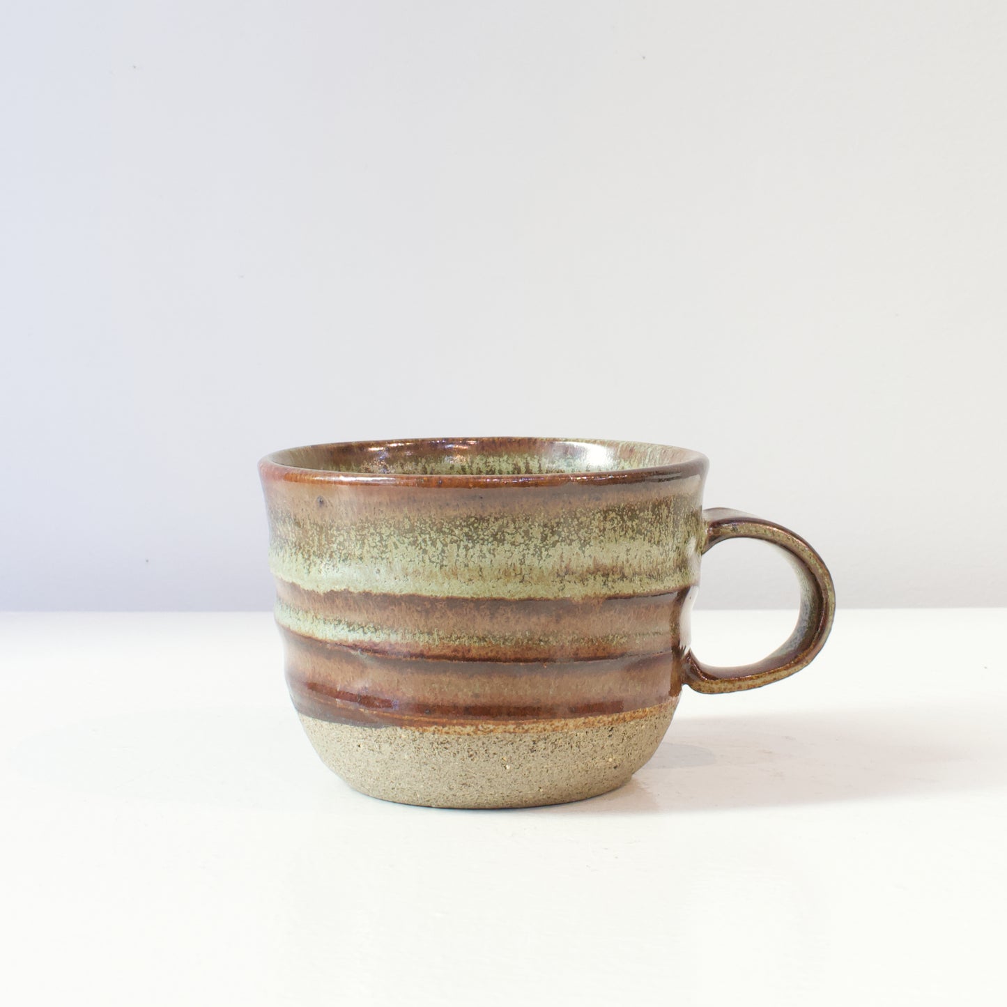 HP122: Brown and green glazed mug