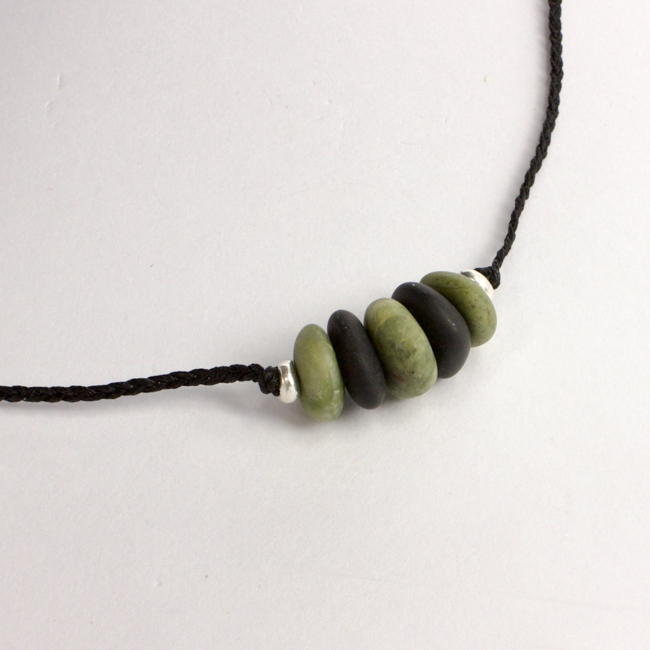 ACT497: Five stone pendant - black and green