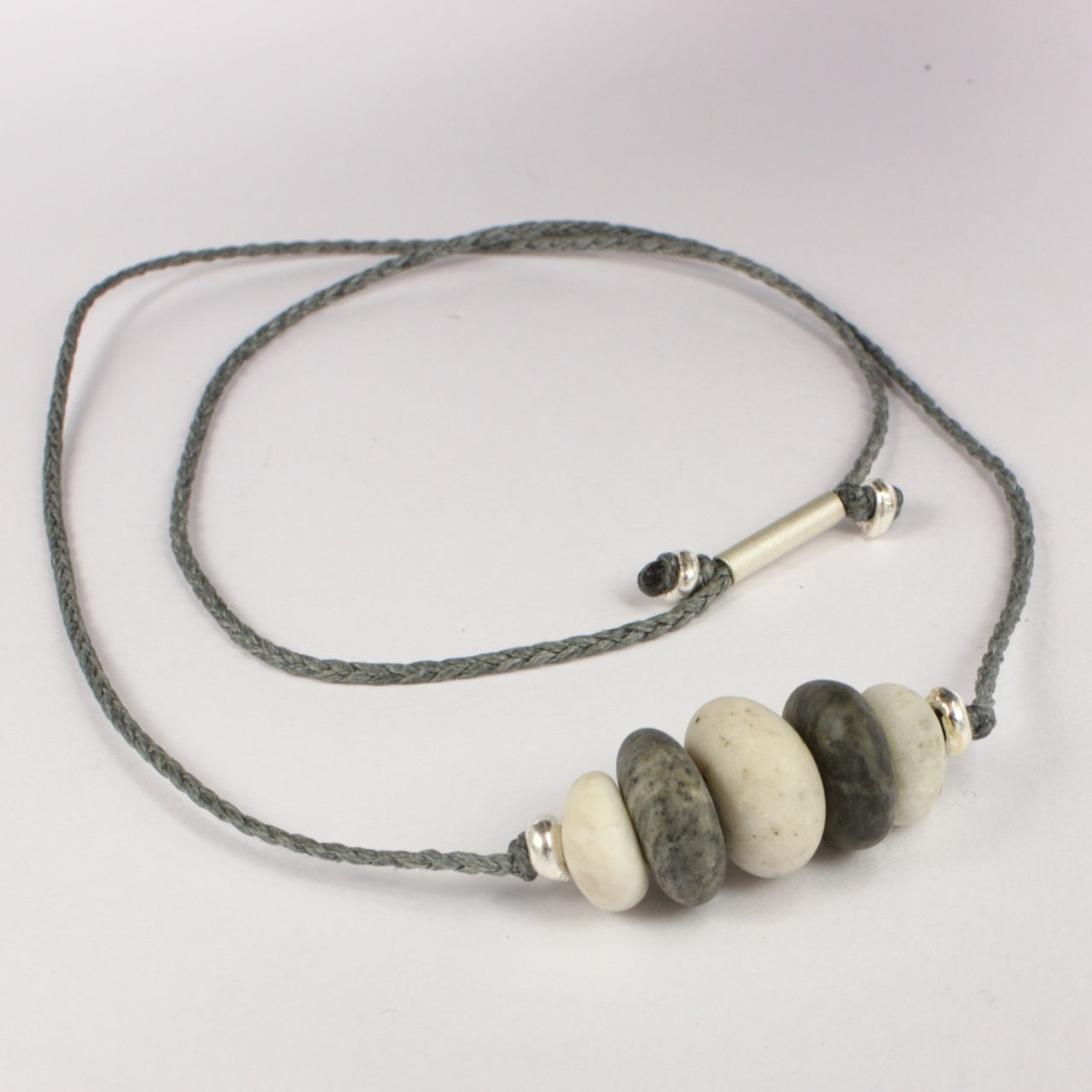 ACT498: Five stone pendant - grey and cream