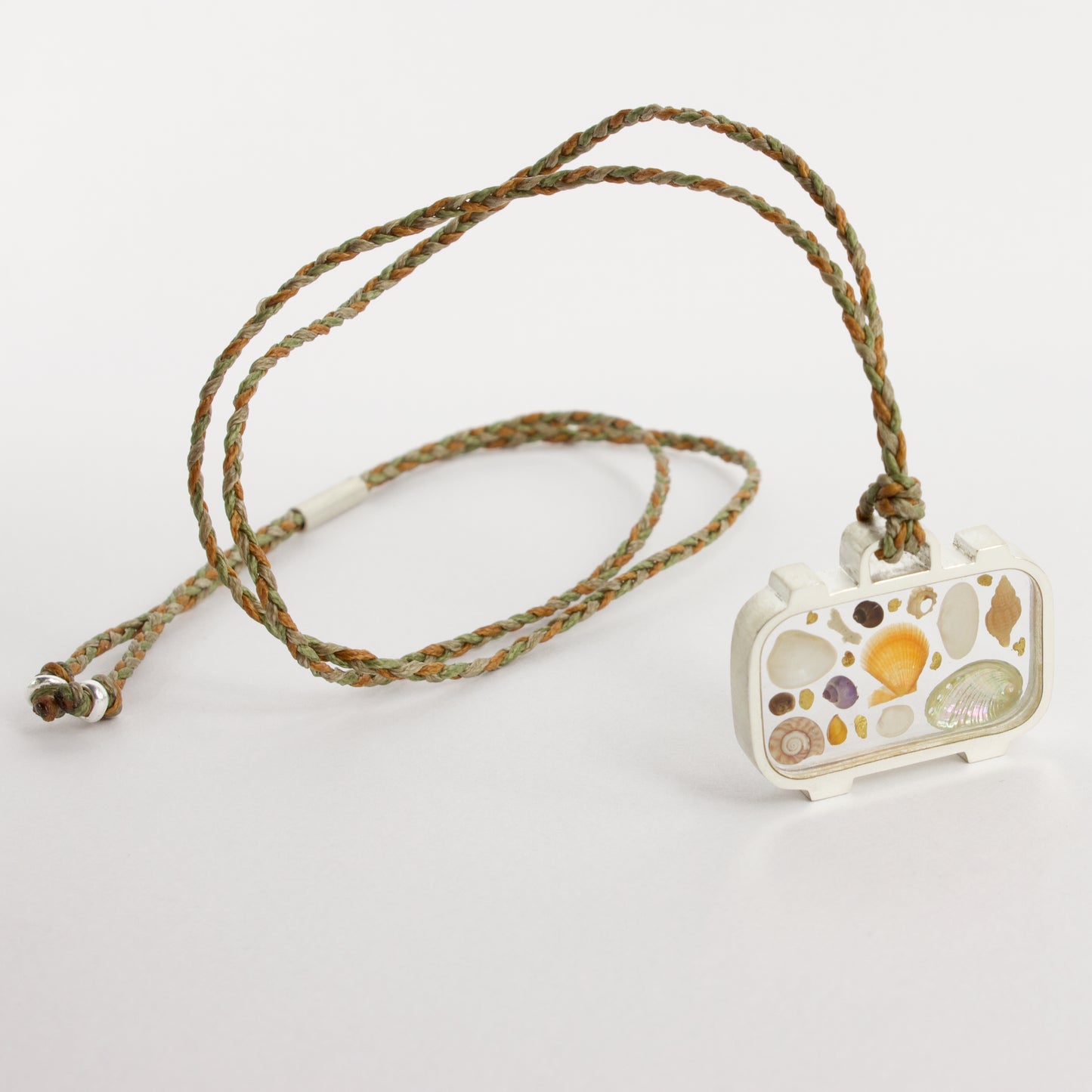 ACT505: Emotional baggage pendant - gold nuggets and shells