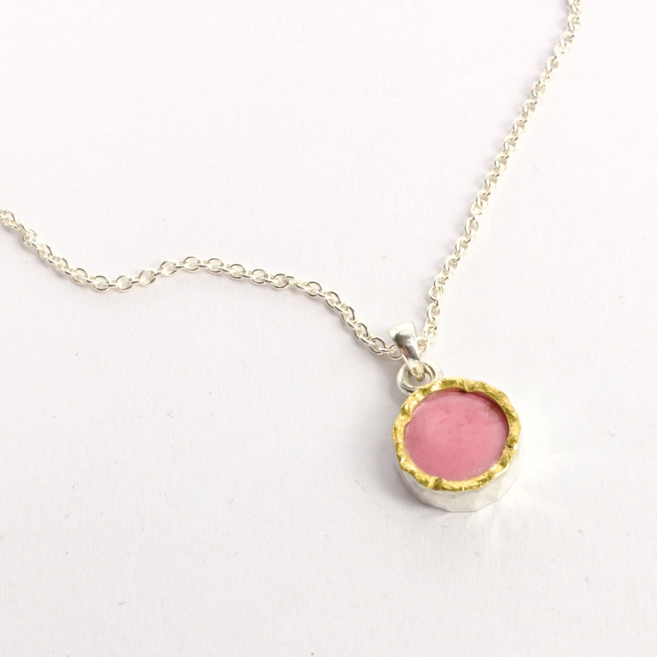 DM381C: Rhodonite gold edged pendant