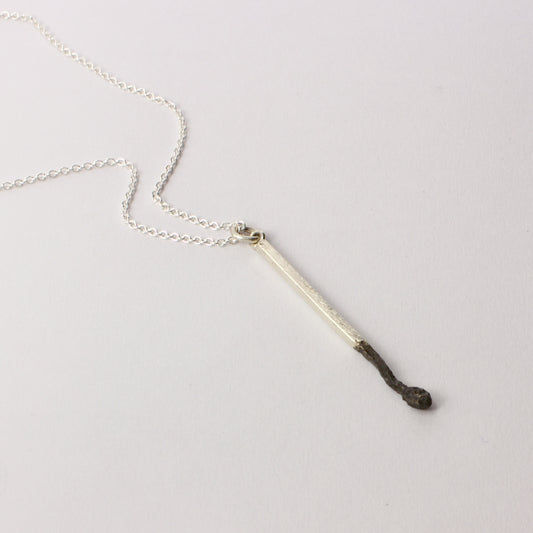 DM387C: Burnt matchstick pendant