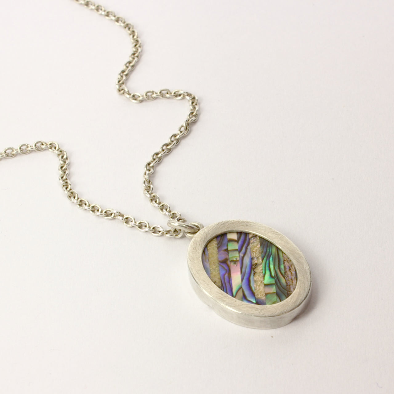 DM634: Pāua sampler pendant