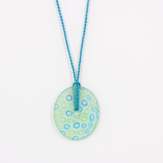GSM21: Carved ellipse pendant