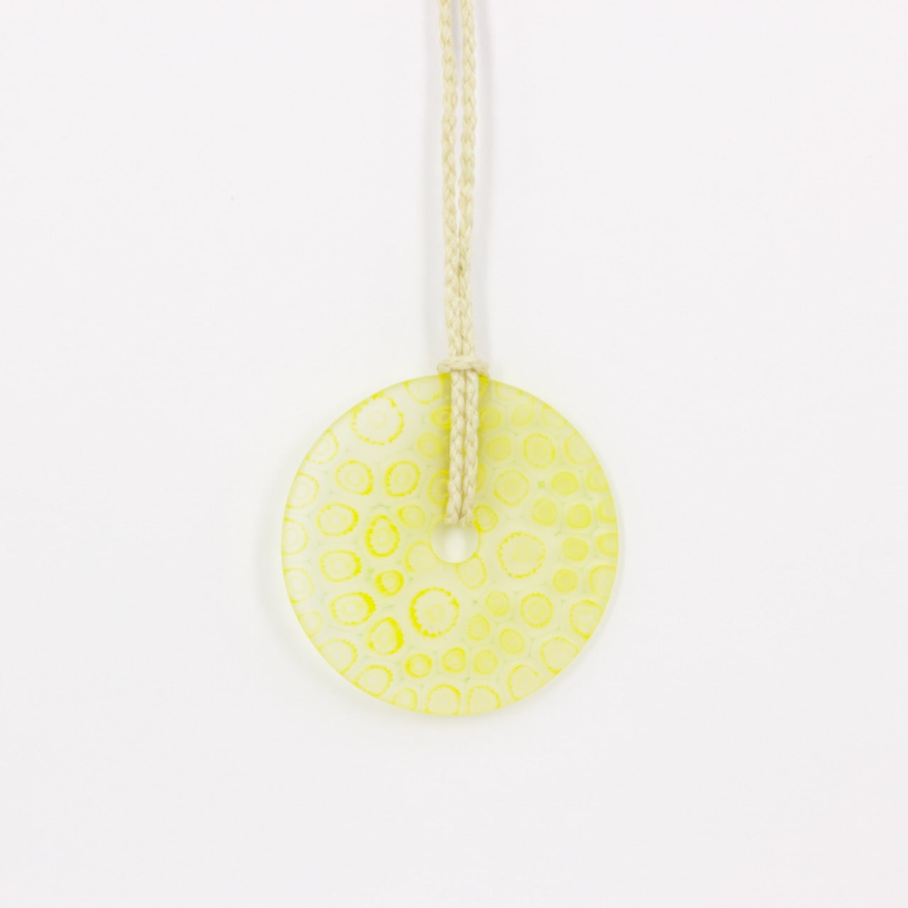 GSM25: Pi disc pendant - yellow canes