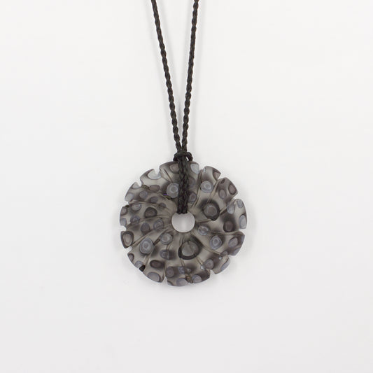 GSM31: Carved shell pendant - black and white