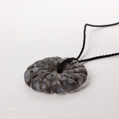 GSM31: Carved shell pendant - black and white