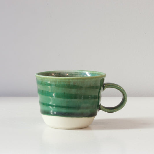HP72: Green glaze on white clay mug