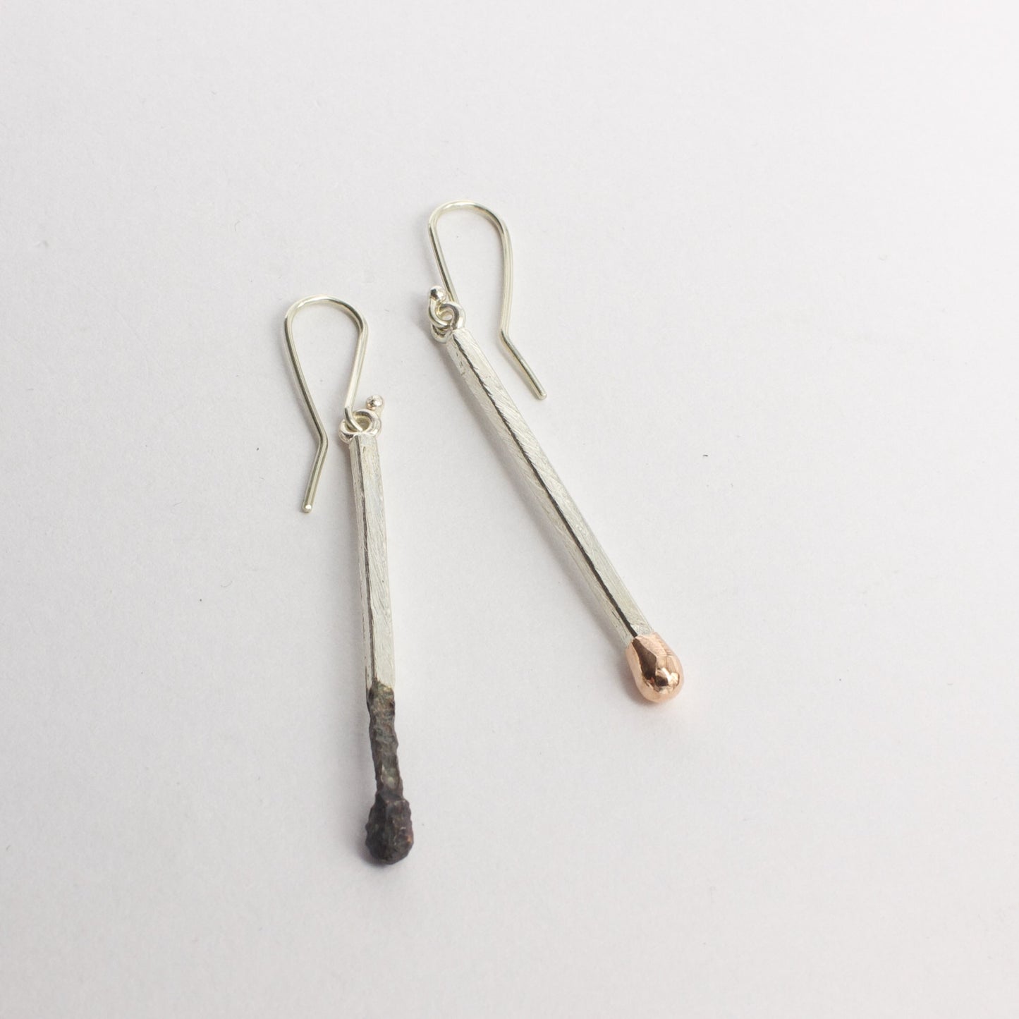 DM: Burnt and live matchstick earrings