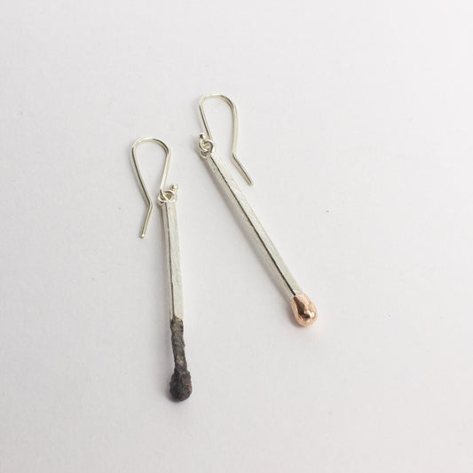 DM: Burnt and live matchstick earrings