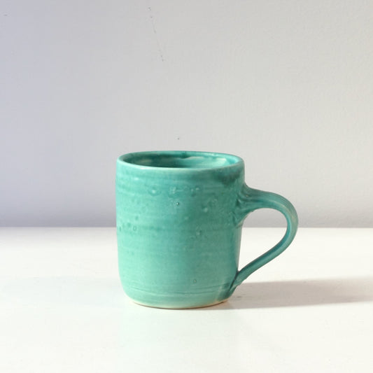 JLA: Turquoise mugs