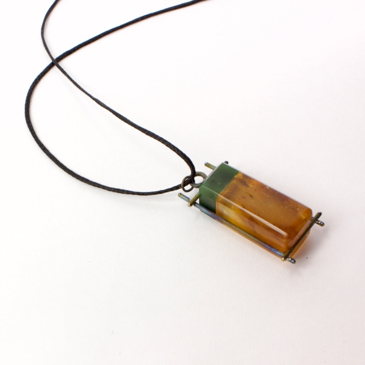 NA194: Kauri gum and pounamu pendant