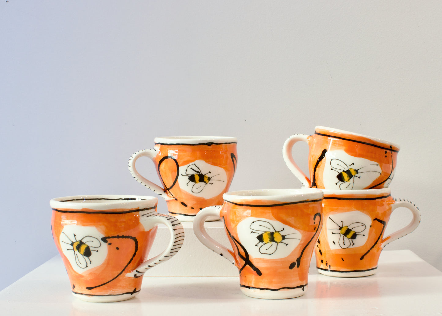 PH: Orange bee cups
