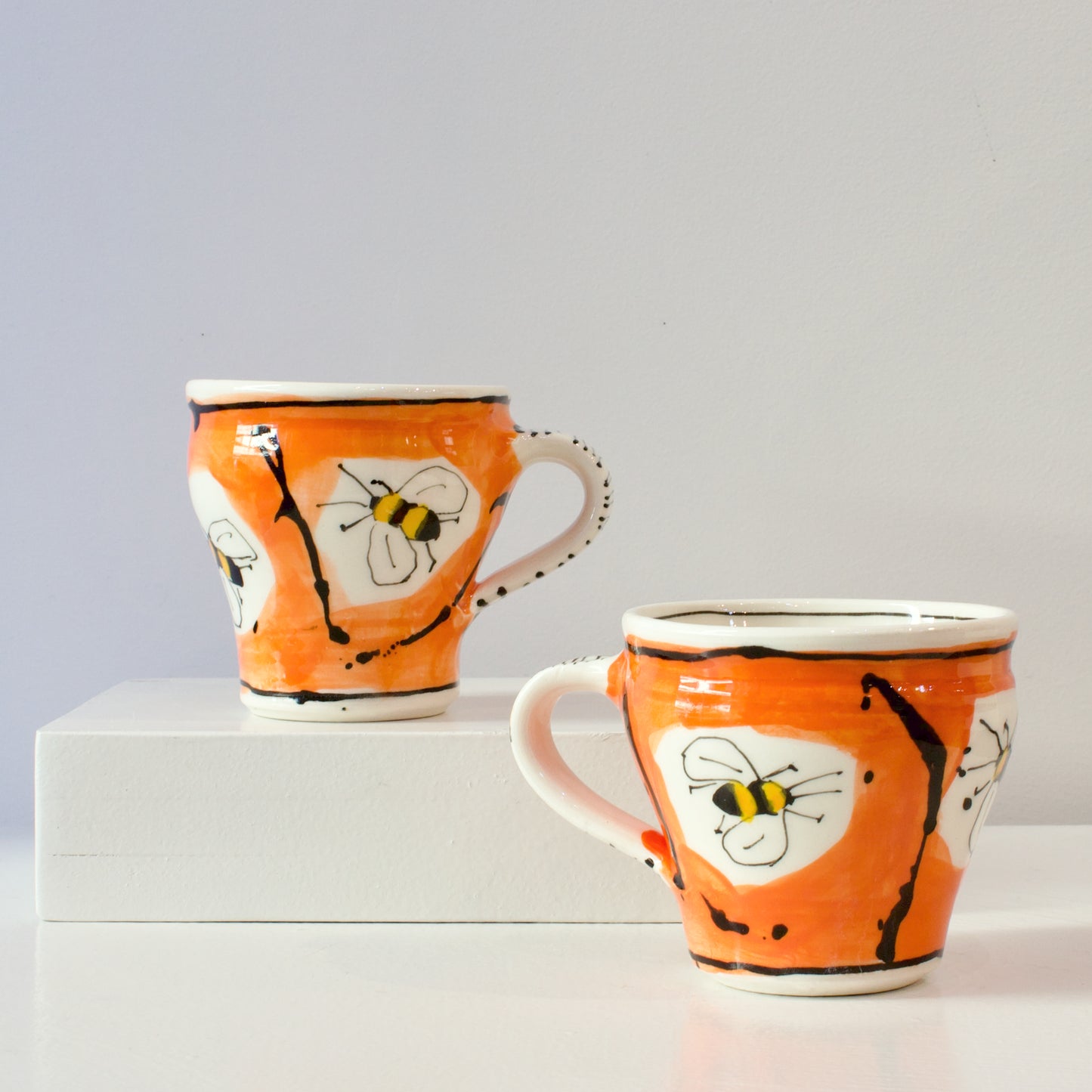 PH: Orange bee cups