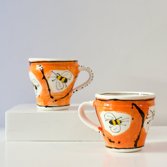 PH: Orange bee cups