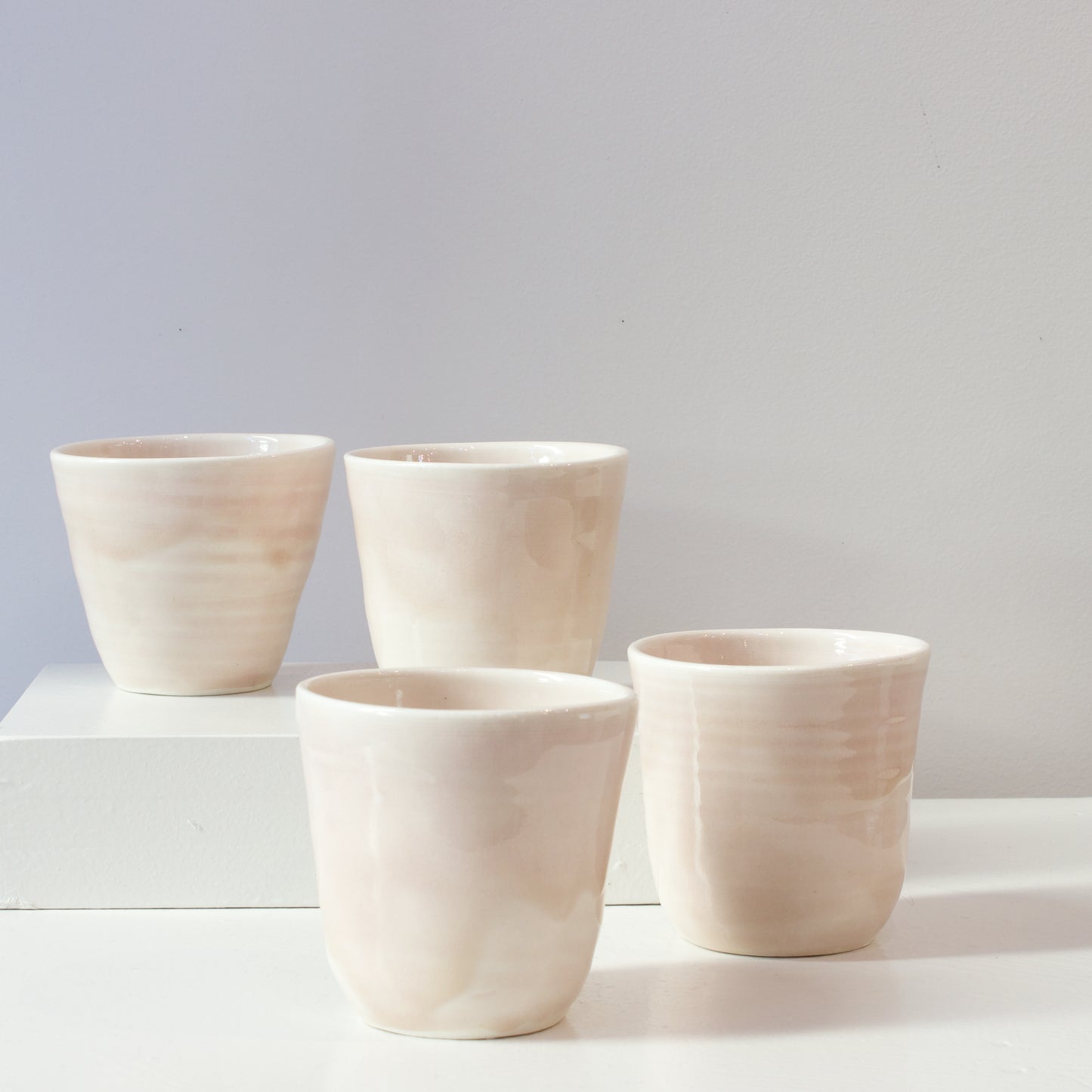JLA: Pink tumblers