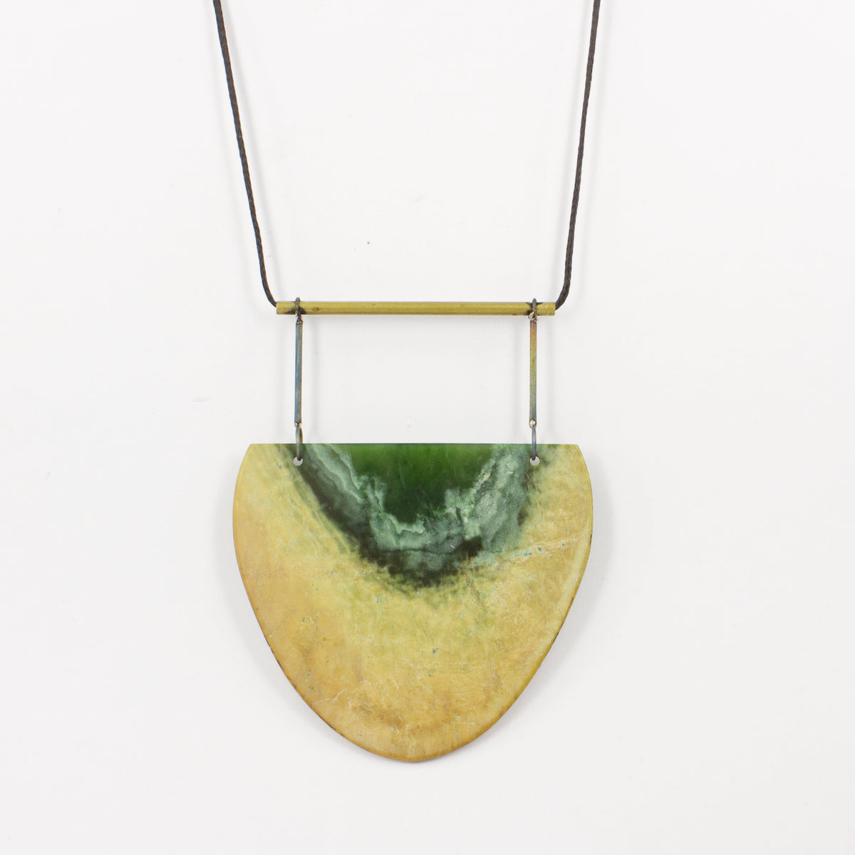 NA173: Pounamu and titanium pendant