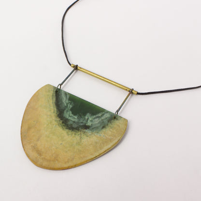 NA173: Pounamu and titanium pendant