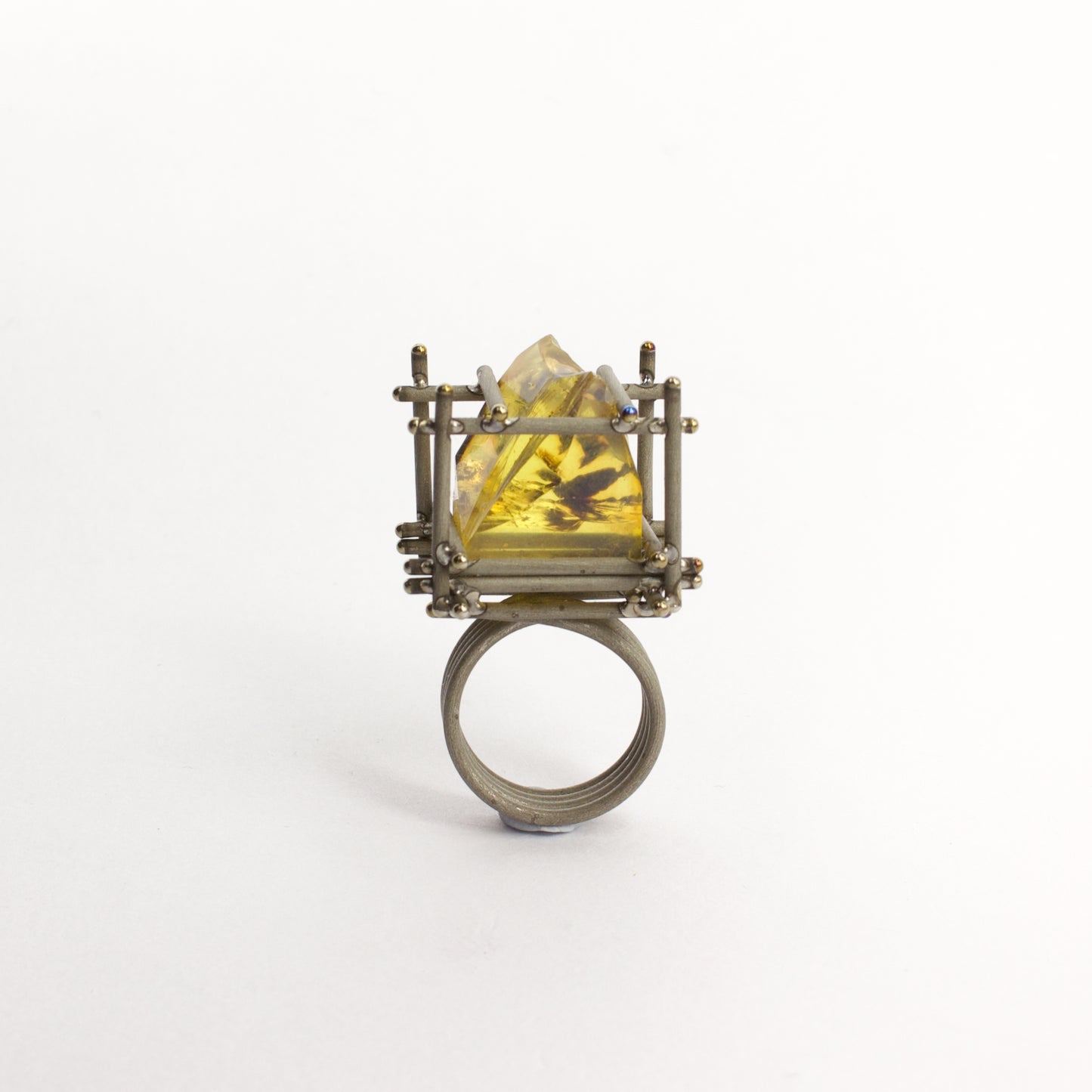 NA129: New Zealand amber and titanium ring