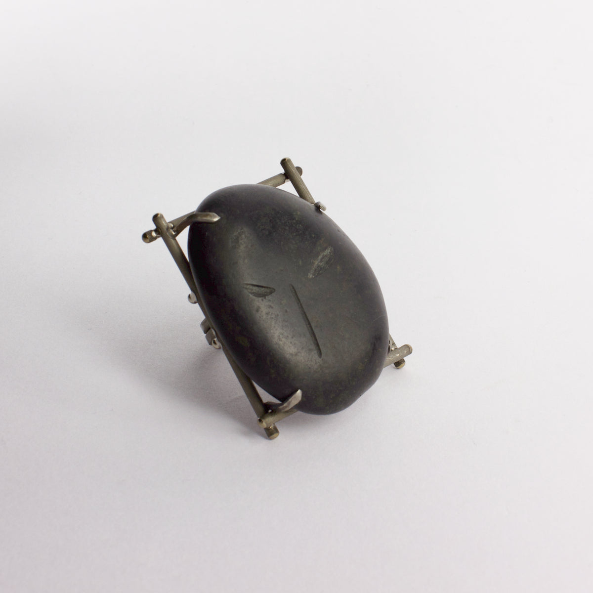 NA127: Carved New Zealand beach pebble ring