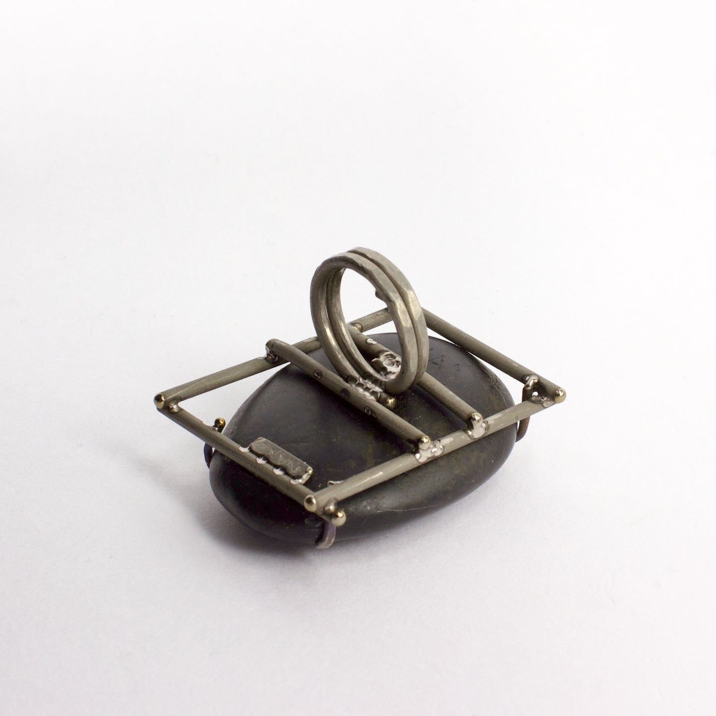 NA127: Carved New Zealand beach pebble ring