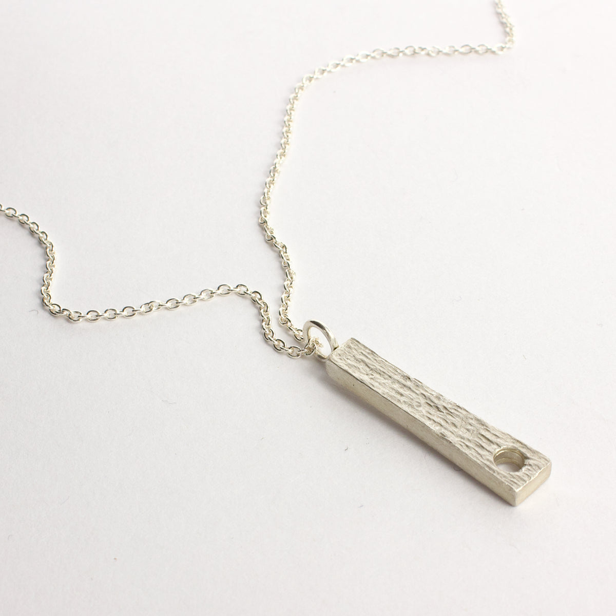 JMU140: Textured pendant