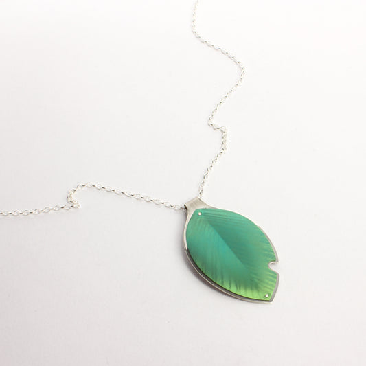 RB219: Pōhutukawa pendant with bite out