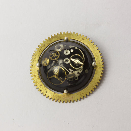 JA78: Cog brooch
