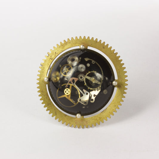 JA78: Cog brooch