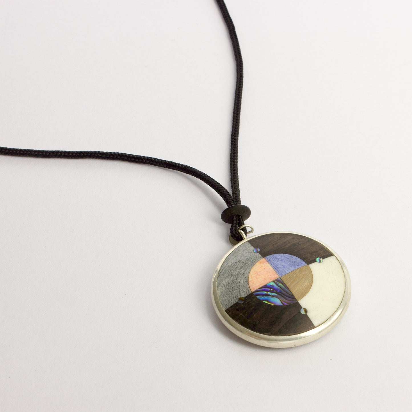 JA98: Double sided starburst pendant