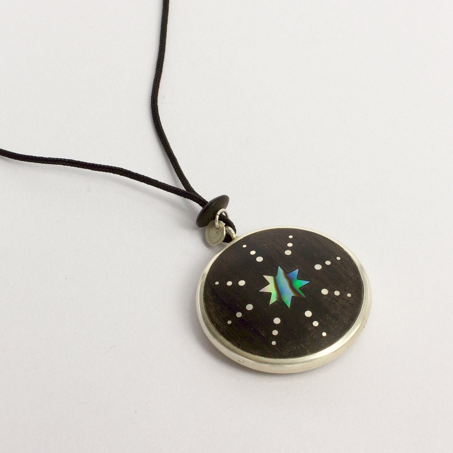 JA99: Double sided starburst pendant - small