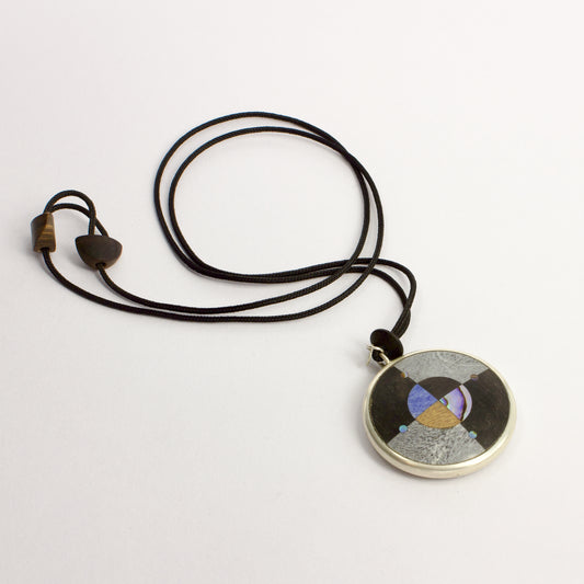 JA99: Double sided starburst pendant - small