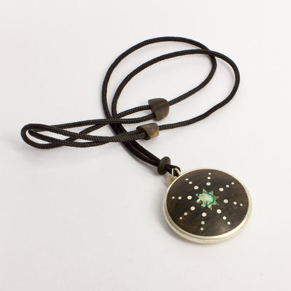 JA98: Double sided starburst pendant