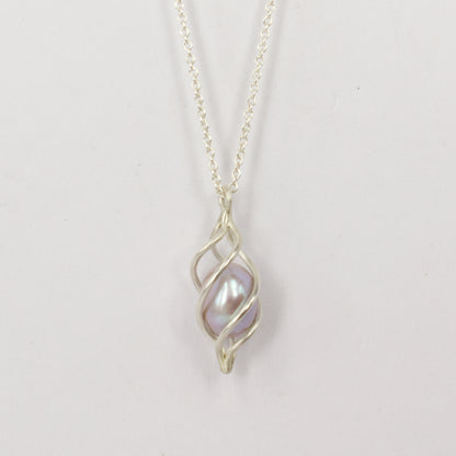 RK37: Caged pearl pendant