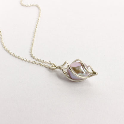 RK37: Caged pearl pendant