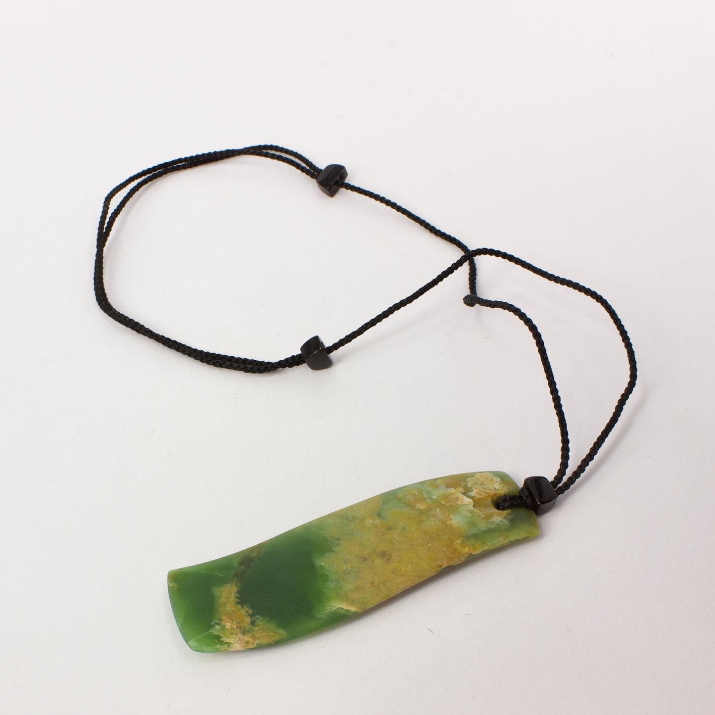SM267: Pounamu wave pendant